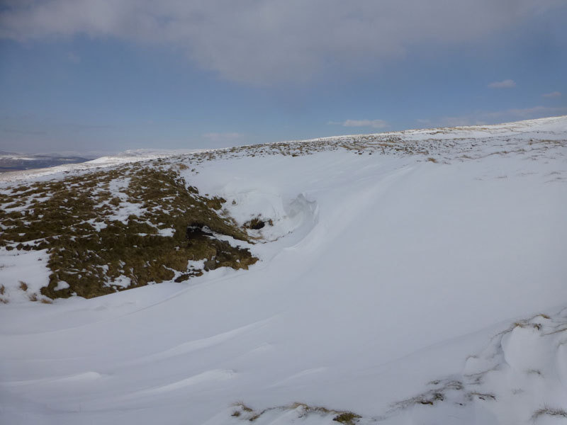 Snow filled sink hole